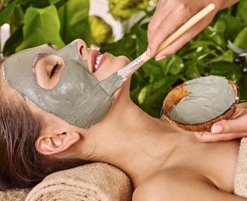 bigstock-Woman-with-clay-facial-mask-in-84642008